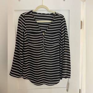 Black and white stripped blouse with gold zipper
